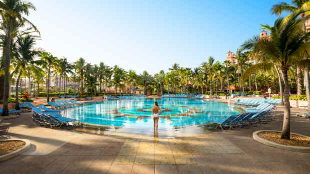 Atlantis_Aquaventure_Royal_Baths_Pool_Woman_Standing_at_Edge_of_Pool